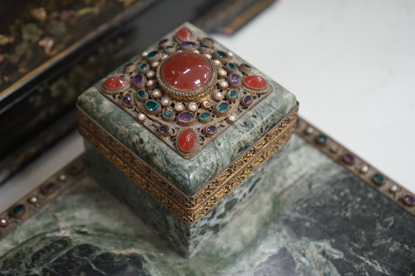 A Victorian papier maché mother of pearl inlaid writing slope and a 19th century French marble desk stand, 36cm wide